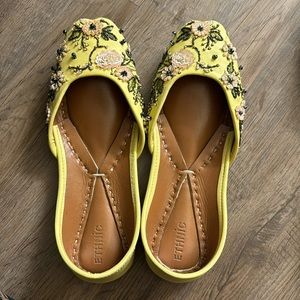 Yellow theard and pearl work